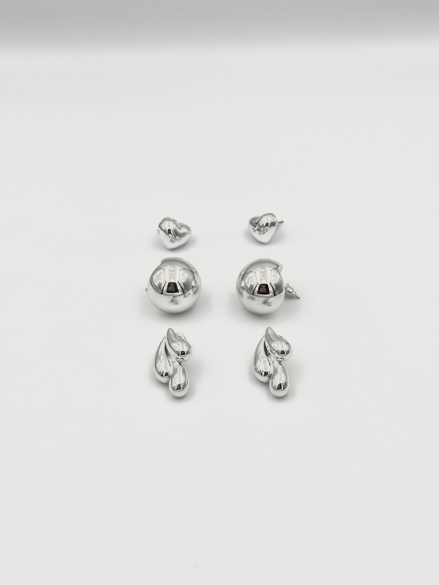 Silver Stud Earring Set – Heart, Ball, and Abstract Leaf Motif