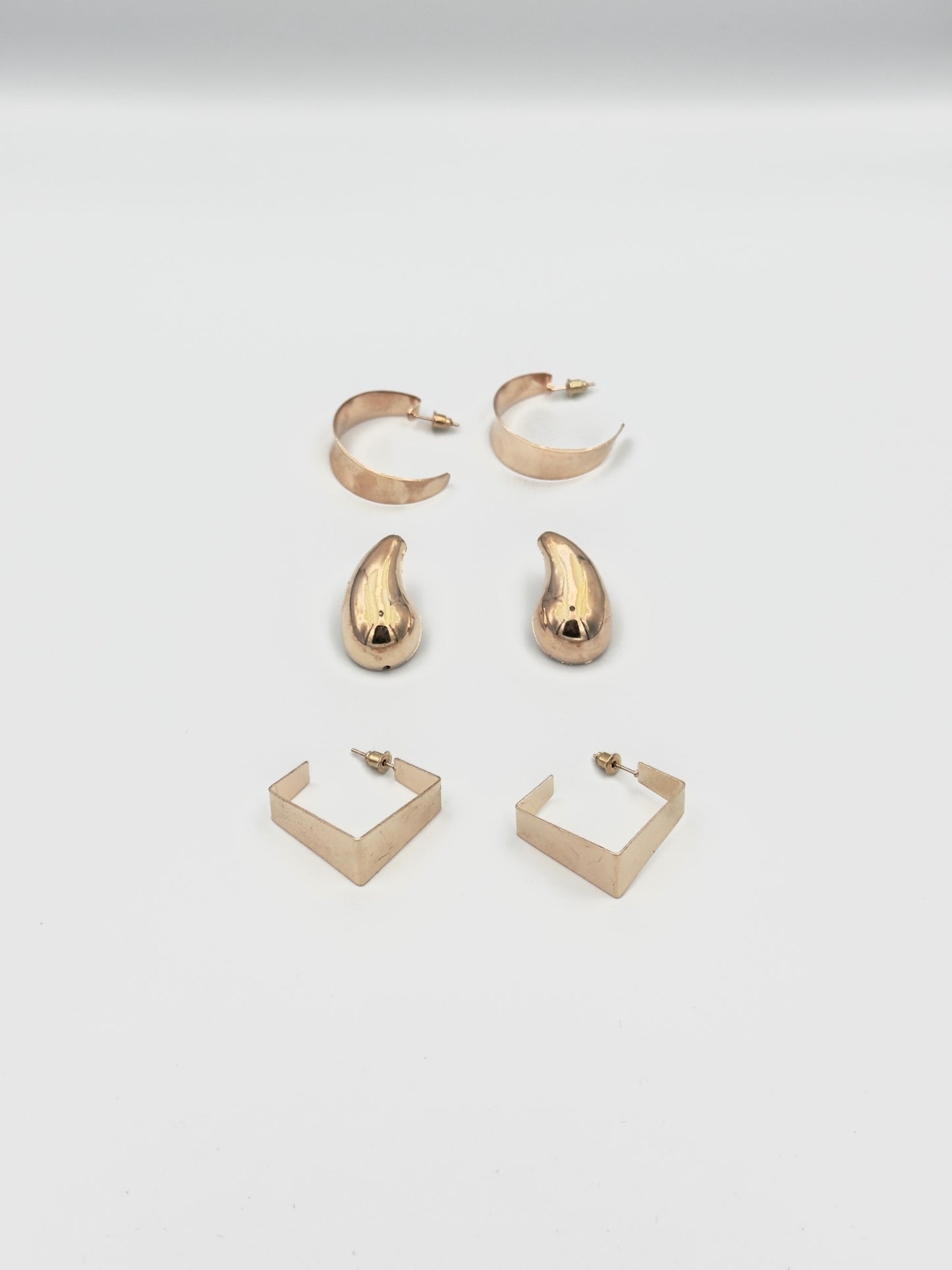Gold Statement Earring Set – Crescent, Abstract Drop, and Geometric Hoop Designs