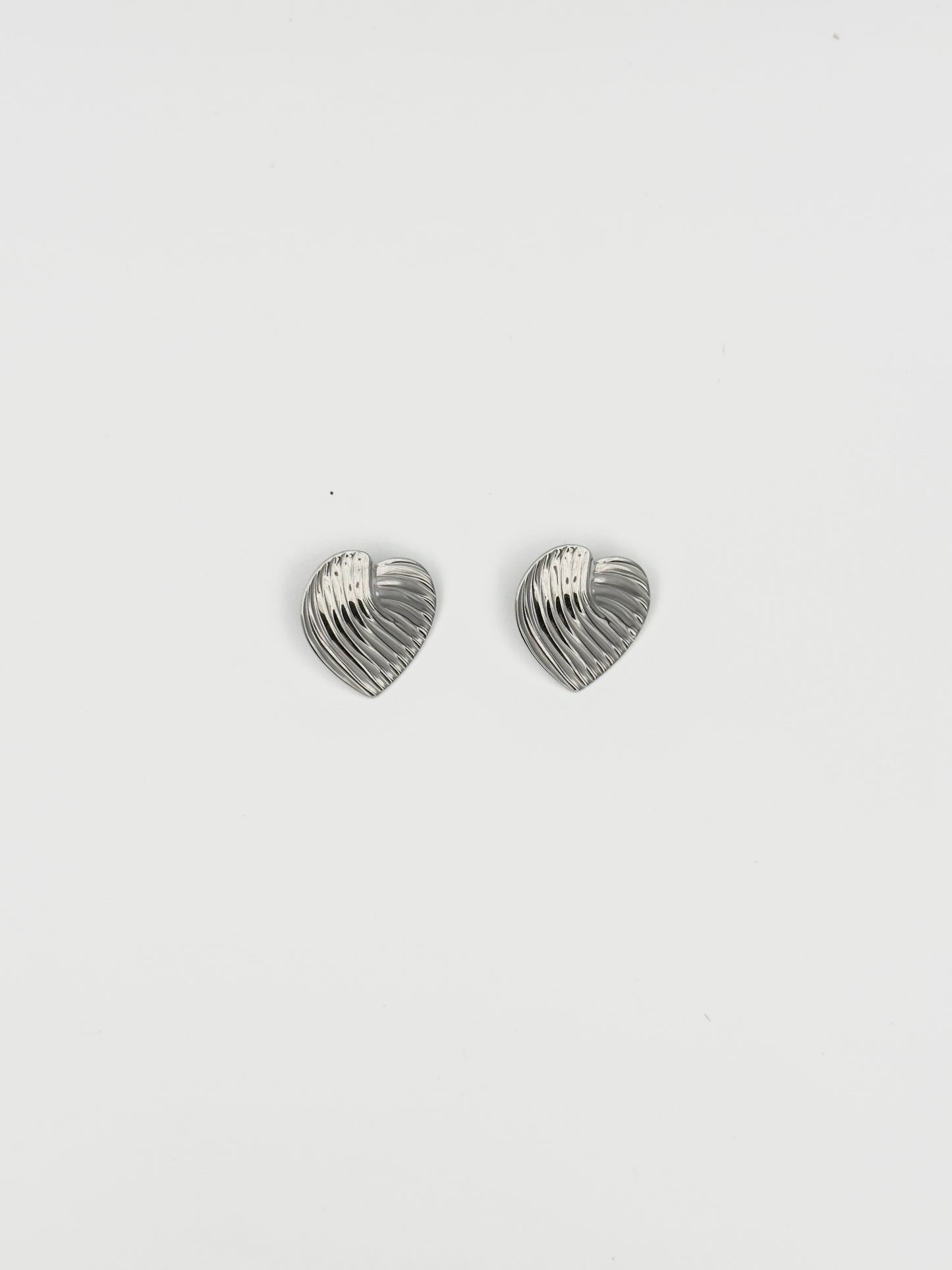 Silver Ribbed Heart Stud Earrings – Textured Romantic Design