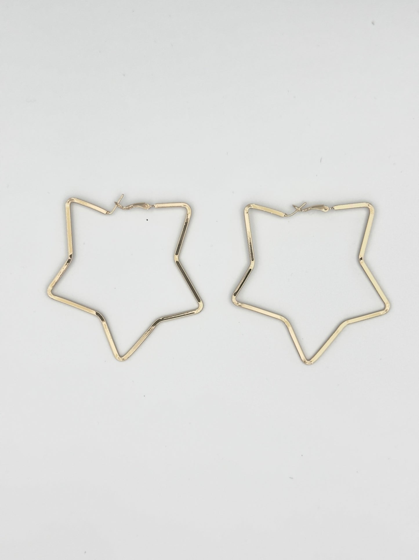 Gold Star Hoop Earrings – Bold Geometric Statement Design